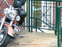 close-up view of a motorcycle in front of a building