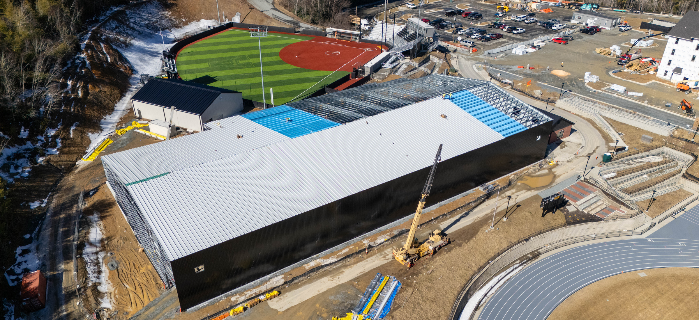 An aerial view of construction progress for the new indoor tennis facility at App State's Appalachian 105 Sports Complex.