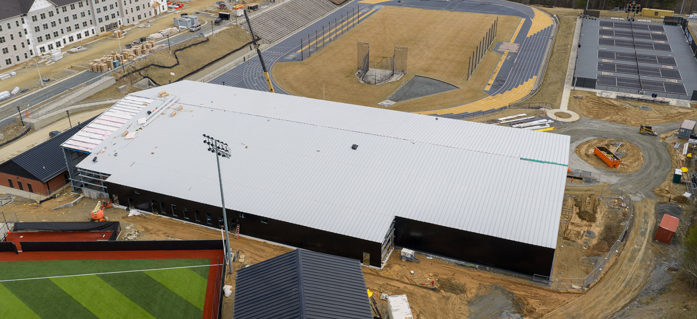 Shown in this aerial image, construction work continues on schedule for the new indoor tennis facility at App State's Appalachian 105 Sports Complex in Boone.