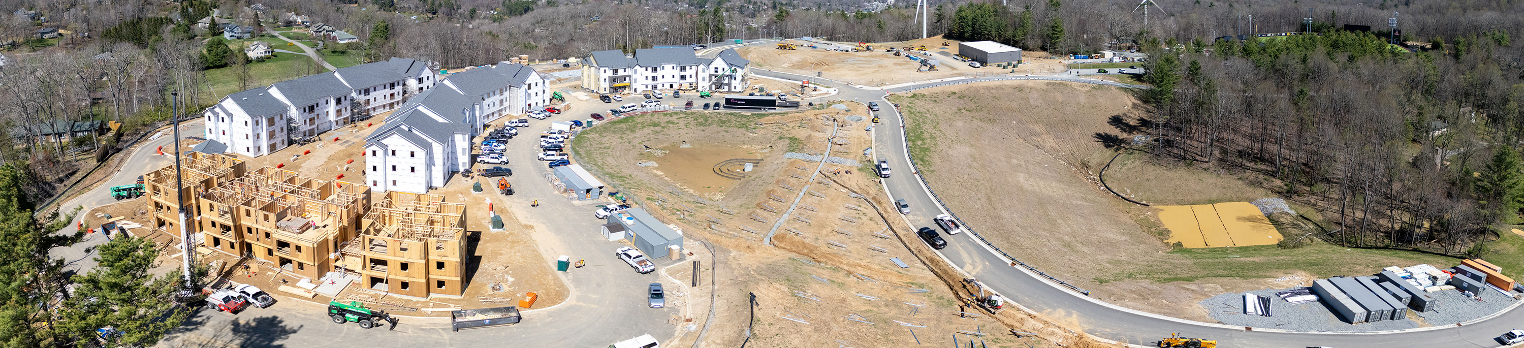 Panoramic view of Innovation District at App State with housing and solar panel installation.