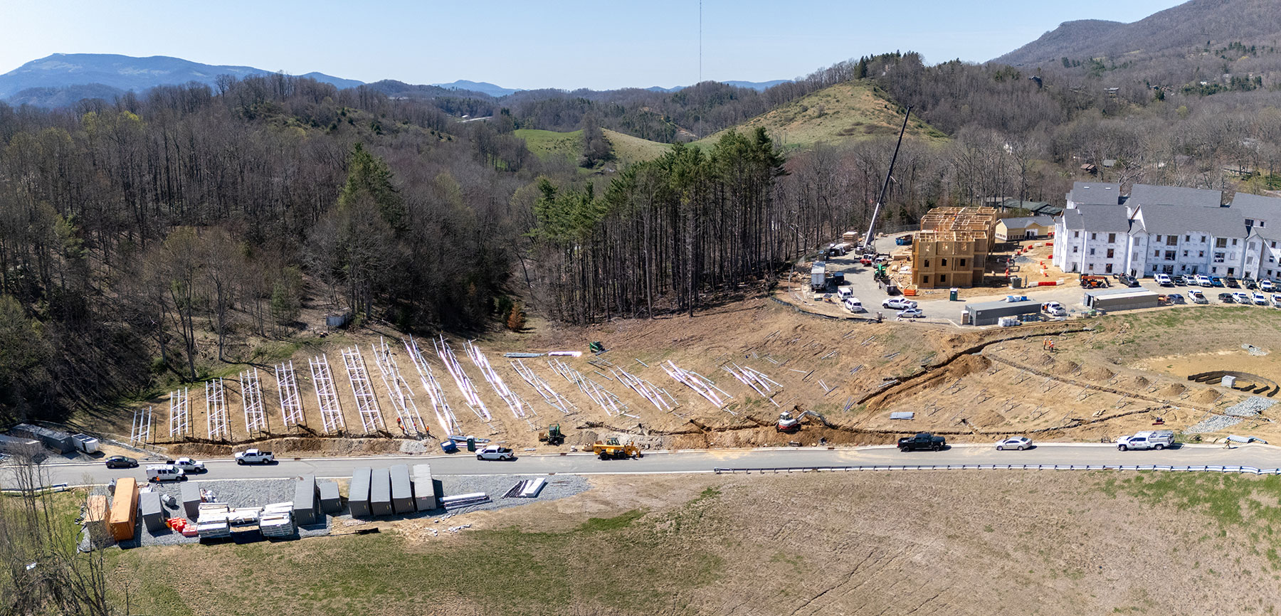 Workers installing frames for solar panels at App State’s Innovation District