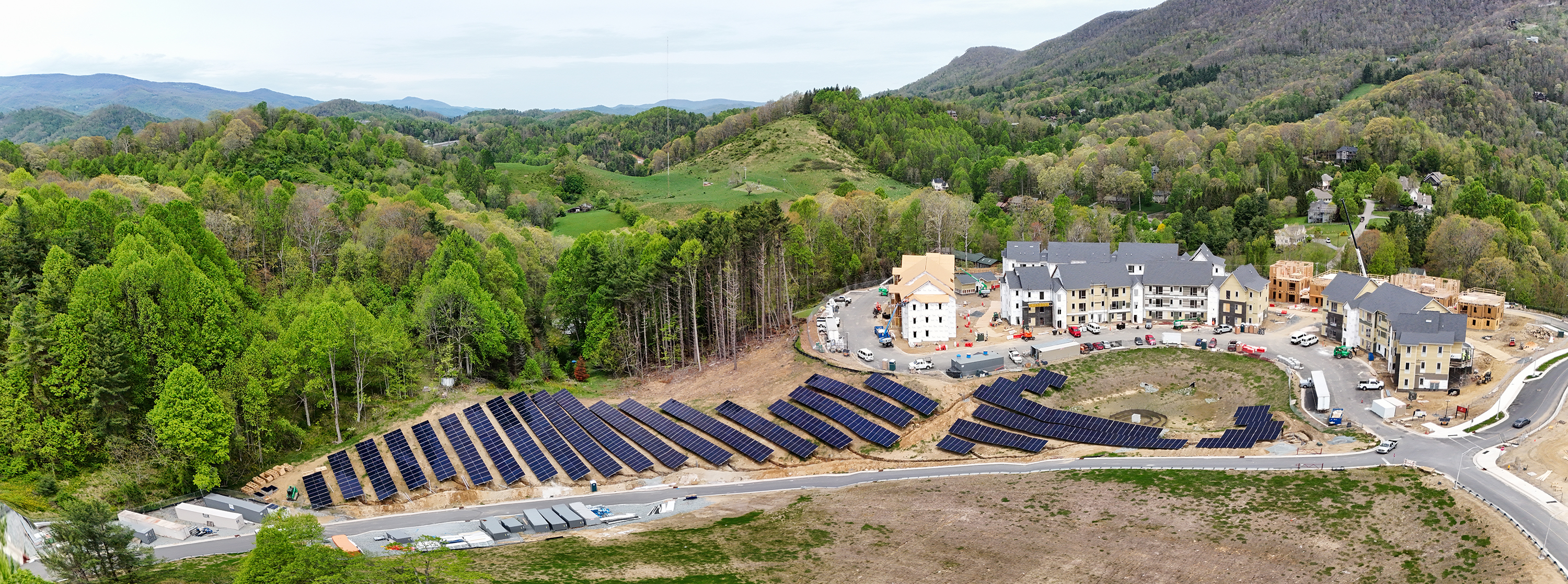 Panoramic view of Innovation District shows solar panels and housing construction, May 7, 2025.