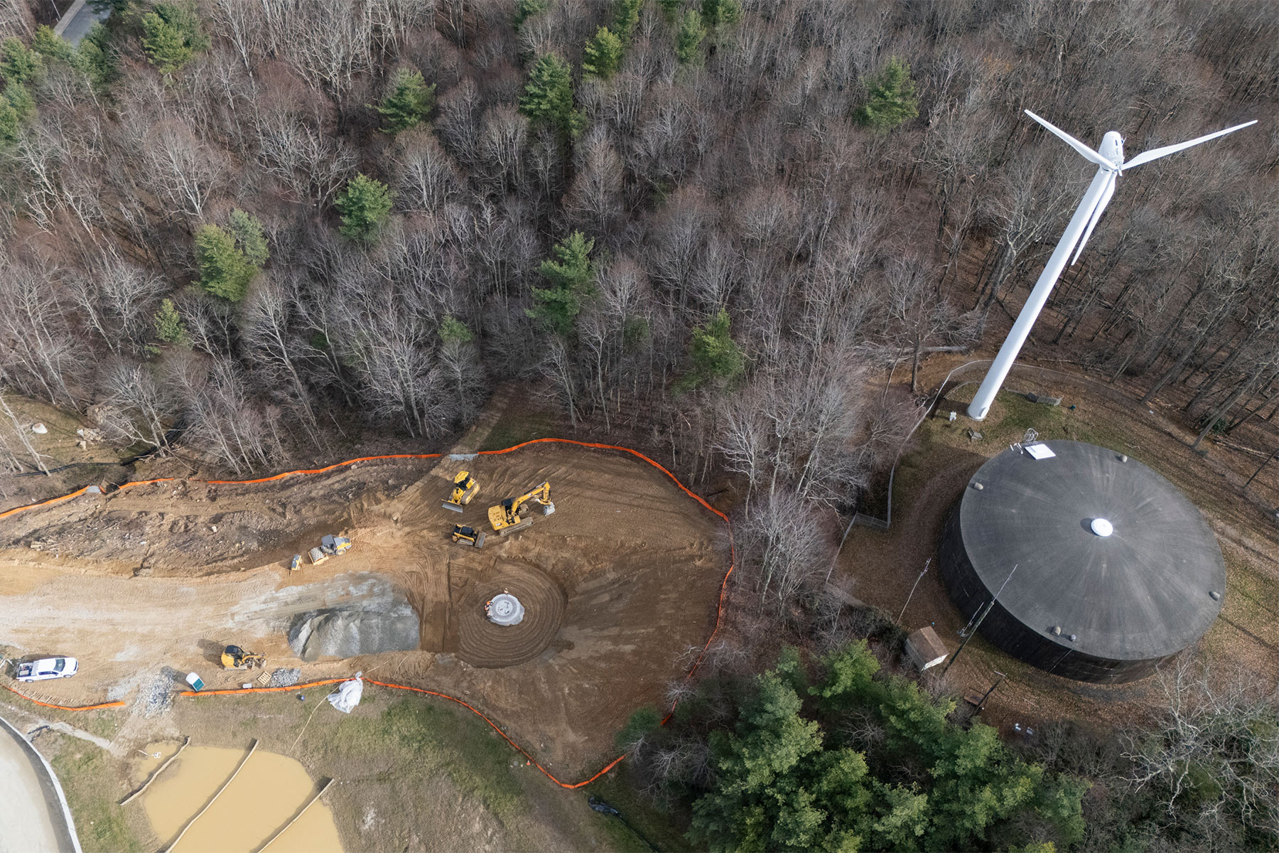 Installation of two new wind turbines. The existing wind turbine located at App State’s Innovation District is visible at right.
