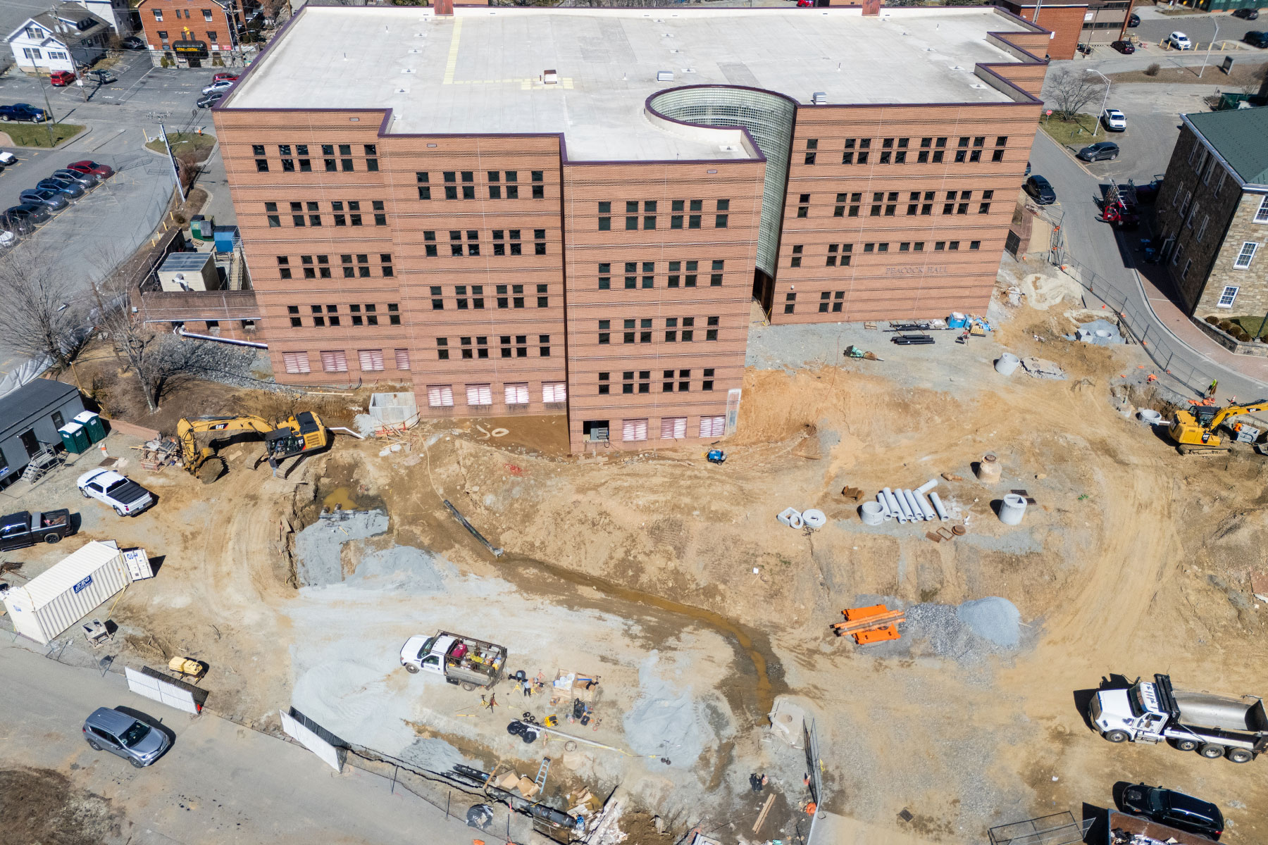 An aerial view of construction progress for the Peacock Hall addition/renovation project, Mar. 11, 2025