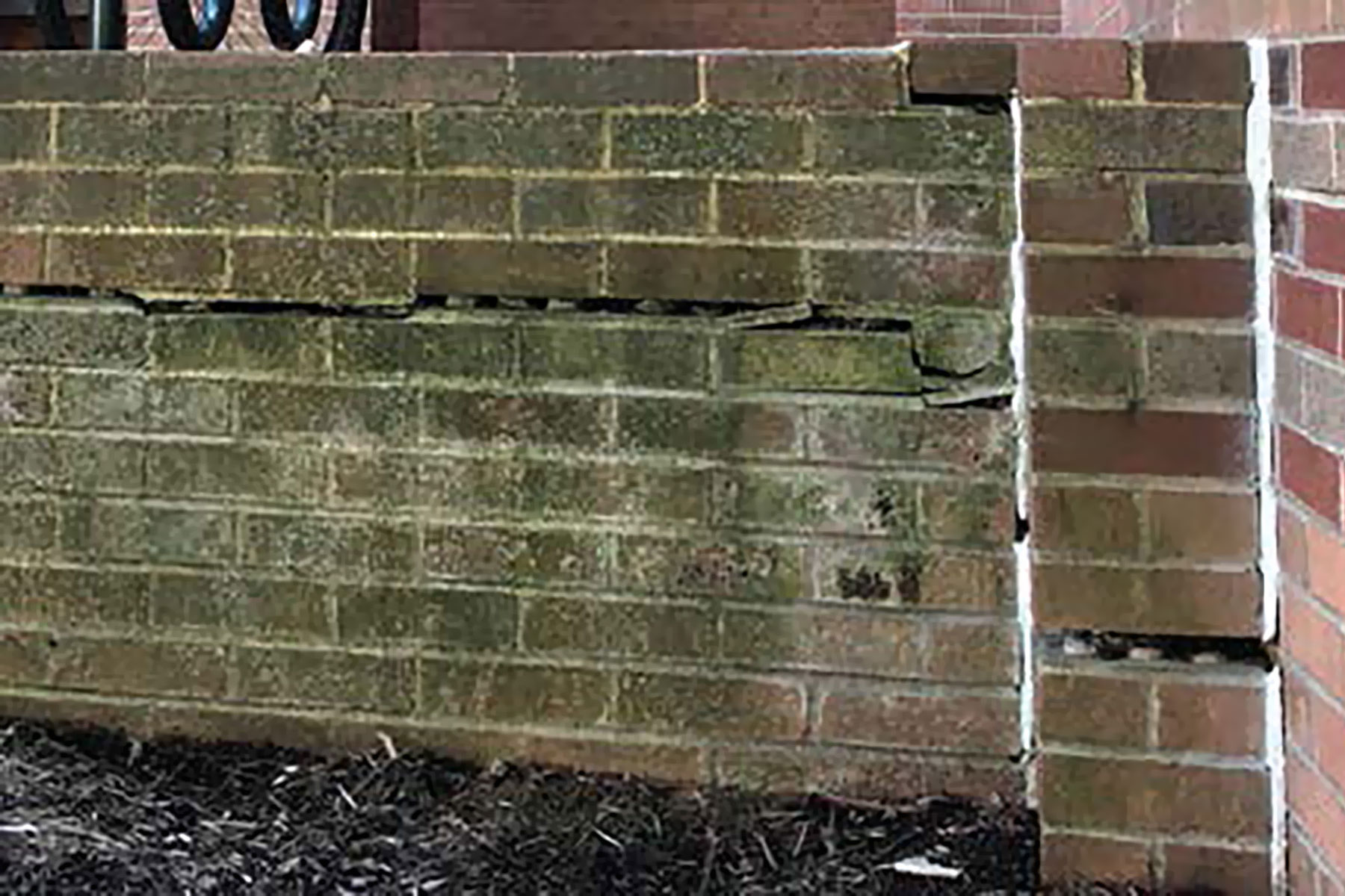Cracked exterior brick at Peacock Hall