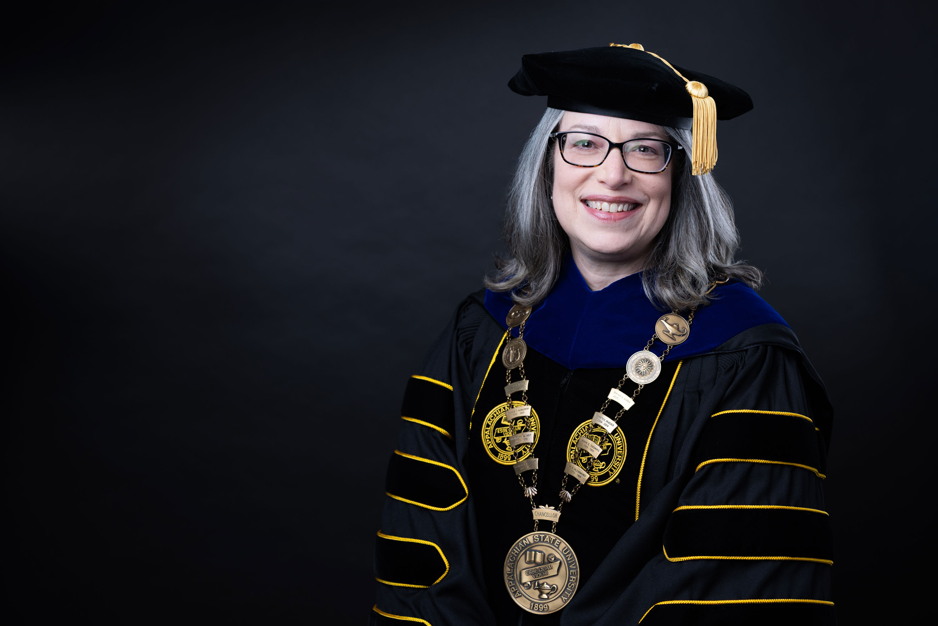 Chancellor Norris wearing chancellor medallion.